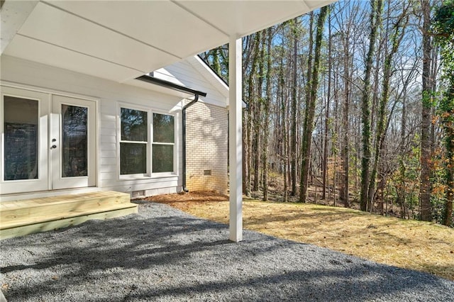 view of yard with french doors