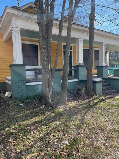 view of home's exterior featuring covered porch