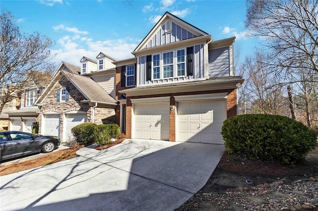 view of front of home featuring an attached garage, brick siding, board and batten siding, and driveway