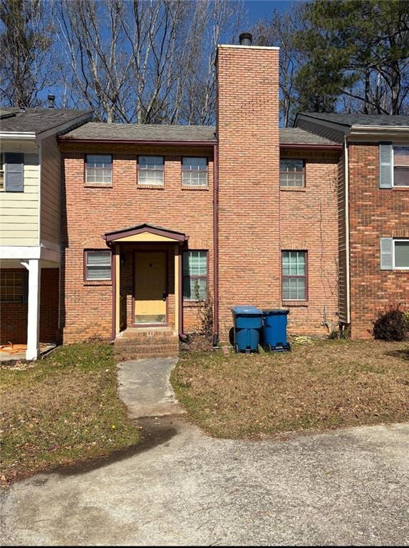 7123 Williamsburg Dr, Riverdale, GA 30274 - multi unit property featuring a chimney and brick siding