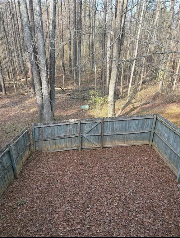 7123 Williamsburg Dr, Riverdale, GA 30274 - view of yard featuring fence