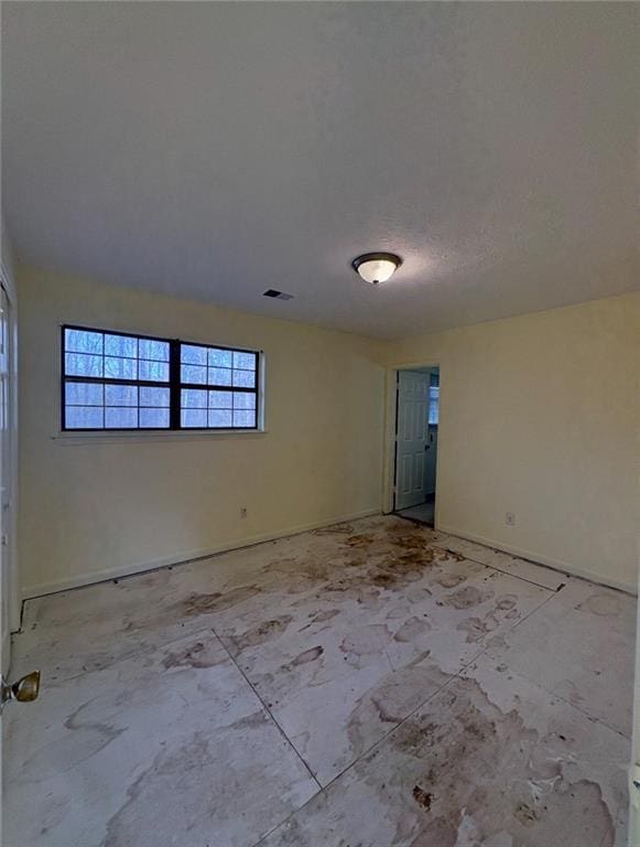 7123 Williamsburg Dr, Riverdale, GA 30274 - unfurnished room with visible vents