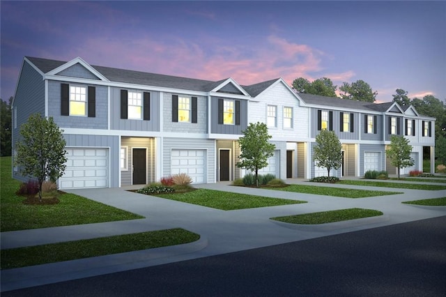 1336 Riverstone Rd Unit 109, Jonesboro, GA 30238 - view of property featuring driveway and a garage