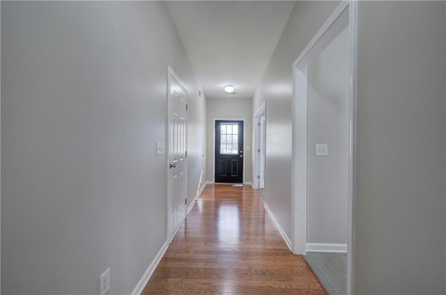 hallway featuring hardwood / wood-style floors