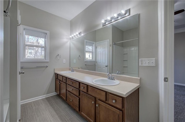 bathroom with vanity and plenty of natural light