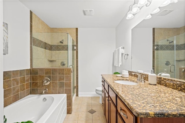 full bath with vanity, tile patterned floors, a bath, and a shower stall