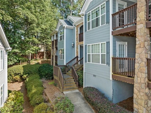 view of side of home with crawl space