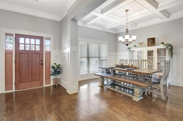 foyer entrance featuring an inviting chandelier, wainscoting, wood finished floors, and beamed ceiling