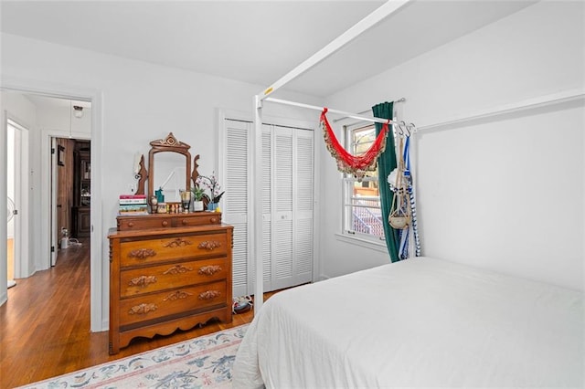 bedroom with wood finished floors