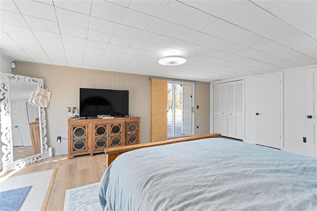 bedroom with light wood-style flooring