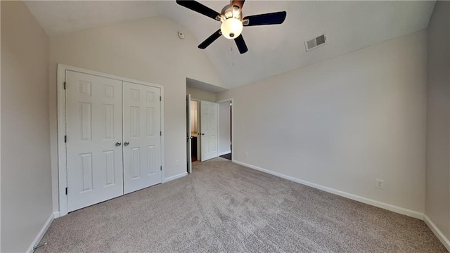 514 Jadetree Ln, Atlanta, GA 30349 - unfurnished bedroom featuring carpet, vaulted ceiling, a closet, baseboards, and ceiling fan