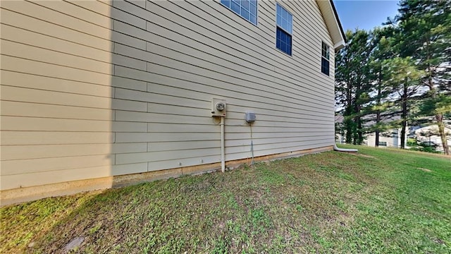 514 Jadetree Ln, Atlanta, GA 30349 - view of home's exterior with a yard