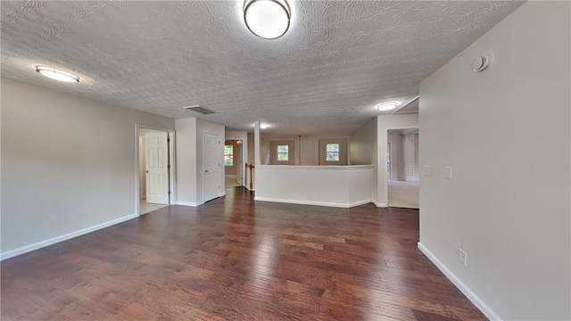 514 Jadetree Ln, Atlanta, GA 30349 - empty room featuring wood finished floors, baseboards, and a smoke detector