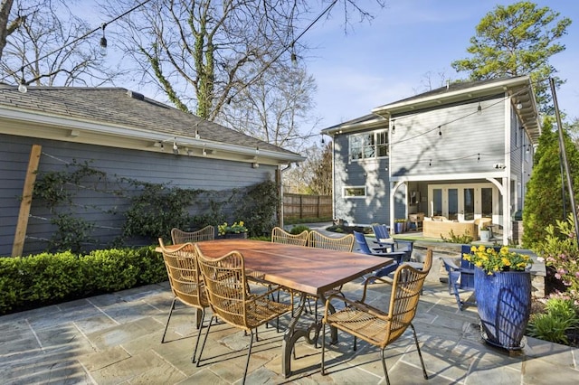 view of patio / terrace with outdoor dining area and fence