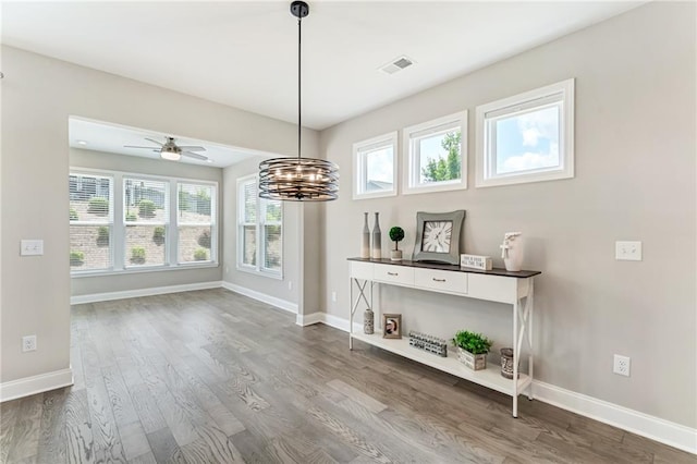 242 Aspen Way, Dallas, GA 30157 - dining room featuring wood finished floors, a chandelier, and ceiling fan