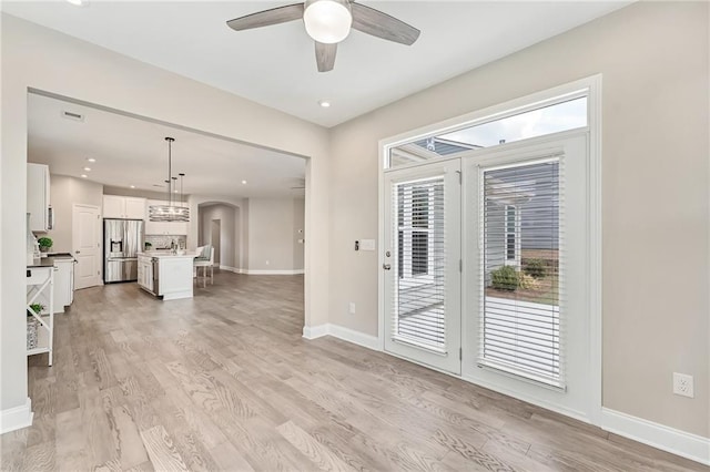 242 Aspen Way, Dallas, GA 30157 - unfurnished living room with a ceiling fan, light wood finished floors, and recessed lighting