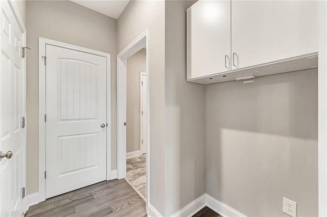 242 Aspen Way, Dallas, GA 30157 - laundry area featuring baseboards and light wood-type flooring