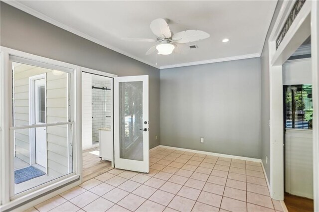 empty room featuring crown molding, light tile patterned floors, plenty of natural light, ceiling fan, and recessed lighting
