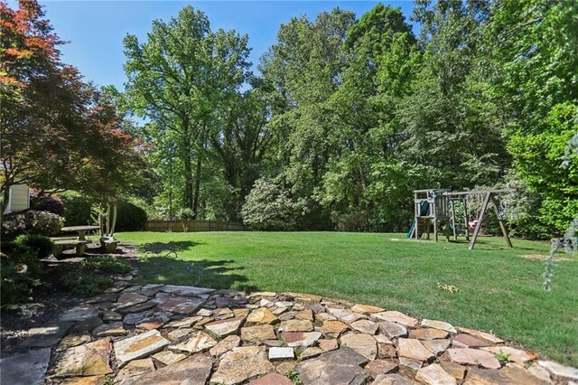 view of yard featuring a playground