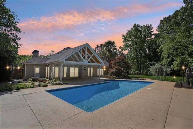 outdoor pool featuring a patio area