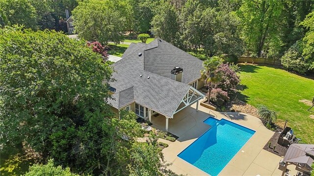 outdoor pool featuring a patio