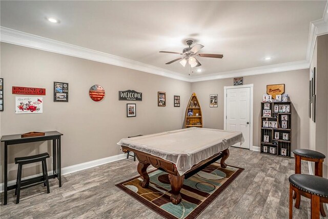 game room featuring ornamental molding, ceiling fan, billiards, and hardwood / wood-style flooring