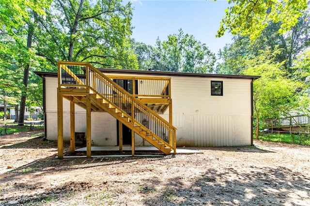 view of playground with a wooden deck