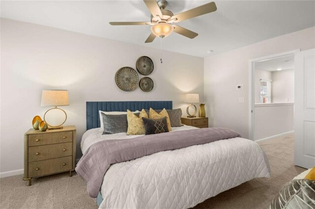1346 Riverstone Rd Unit 107, Jonesboro, GA 30238 - bedroom featuring ceiling fan, baseboards, and carpet floors