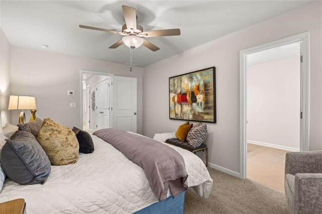1346 Riverstone Rd Unit 107, Jonesboro, GA 30238 - carpeted bedroom featuring ceiling fan and baseboards