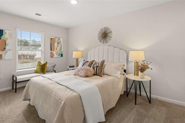 1346 Riverstone Rd Unit 107, Jonesboro, GA 30238 - carpeted bedroom with visible vents and baseboards
