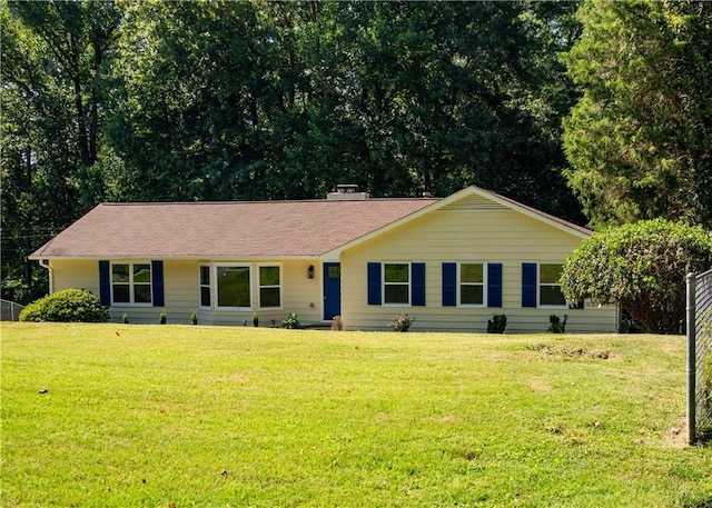 single story home with a front yard