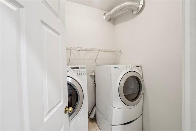 laundry area featuring laundry area and washer and dryer