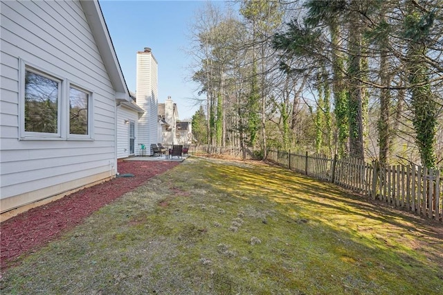 view of yard featuring a fenced backyard