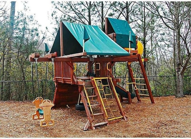 view of play area featuring fence