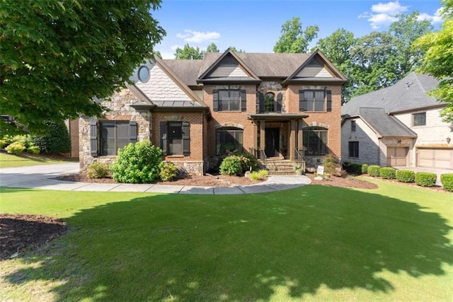 2539 Sagebrush Trl, Buford, GA 30519 - view of front of home with a front lawn and stone siding
