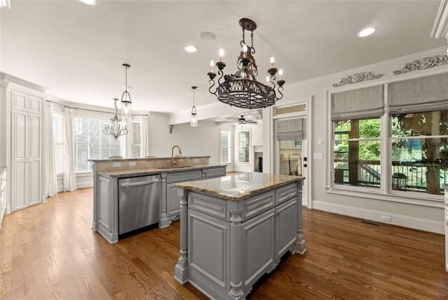 2539 Sagebrush Trl, Buford, GA 30519 - kitchen featuring gray cabinetry, stainless steel dishwasher, a kitchen island, a chandelier, and a ceiling fan