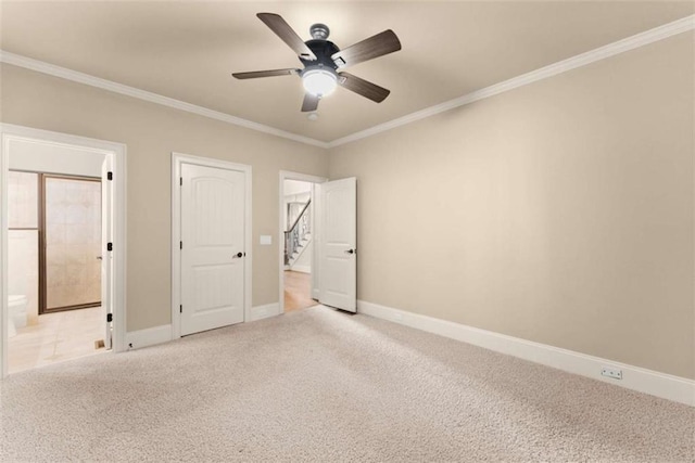 2539 Sagebrush Trl, Buford, GA 30519 - unfurnished bedroom featuring carpet flooring, crown molding, ensuite bathroom, and ceiling fan