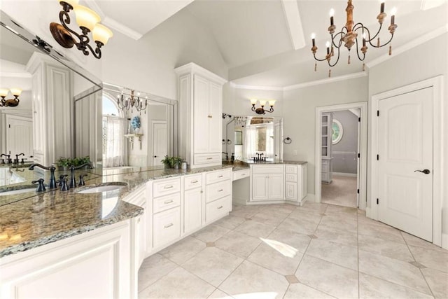 2539 Sagebrush Trl, Buford, GA 30519 - full bath featuring a chandelier, ornamental molding, vanity, lofted ceiling, and plenty of natural light