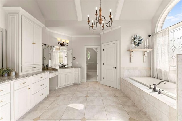 2539 Sagebrush Trl, Buford, GA 30519 - full bathroom with a chandelier, vanity, a garden tub, healthy amount of natural light, and ornamental molding