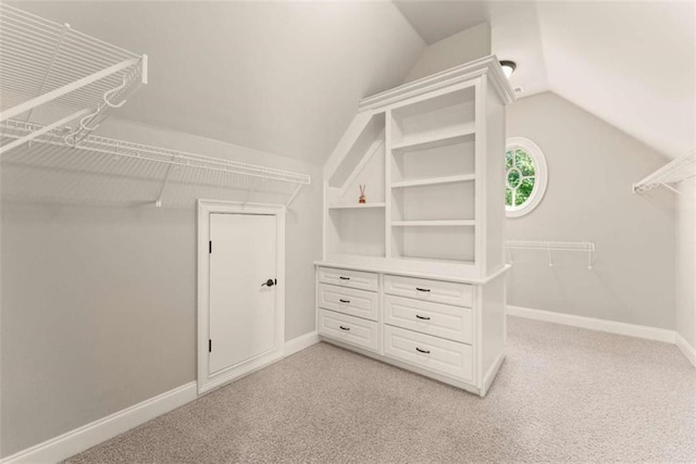 2539 Sagebrush Trl, Buford, GA 30519 - walk in closet with lofted ceiling and light colored carpet