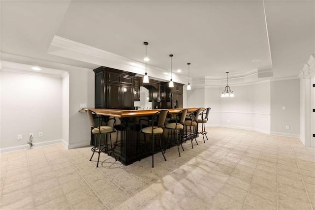 2539 Sagebrush Trl, Buford, GA 30519 - indoor wet bar featuring ornamental molding, recessed lighting, pendant lighting, fridge with ice dispenser, and a raised ceiling