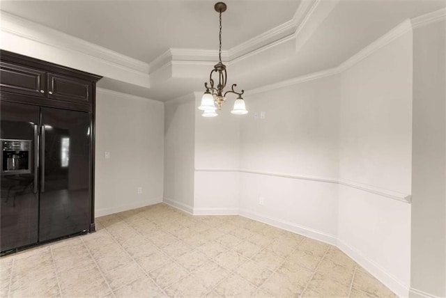 2539 Sagebrush Trl, Buford, GA 30519 - unfurnished dining area with a raised ceiling, crown molding, a chandelier, and light flooring
