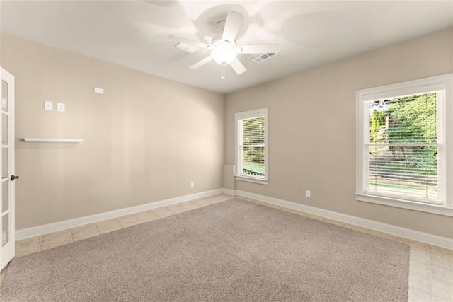 2539 Sagebrush Trl, Buford, GA 30519 - carpeted spare room with ceiling fan and baseboards