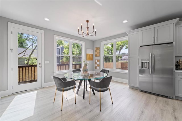 101 Fairfield Ct, Atlanta, GA 30314 - dining space with a chandelier, light wood-style flooring, baseboards, and recessed lighting