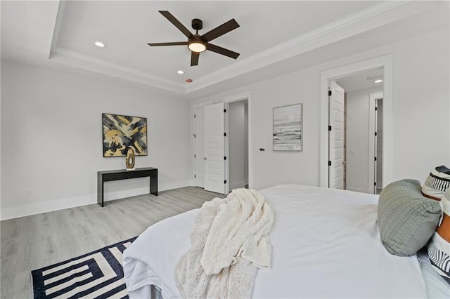 101 Fairfield Ct, Atlanta, GA 30314 - bedroom featuring wood finished floors, recessed lighting, a tray ceiling, crown molding, and baseboards