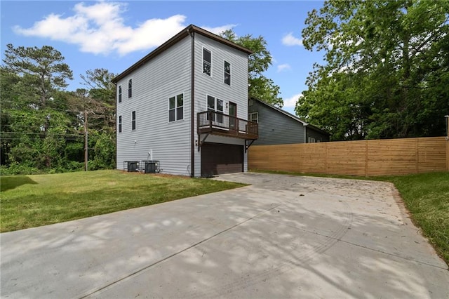 101 Fairfield Ct, Atlanta, GA 30314 - view of side of property featuring concrete driveway, a garage, and a balcony