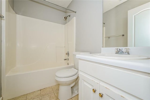 bathroom featuring vanity, bathing tub / shower combination, toilet, and tile patterned floors