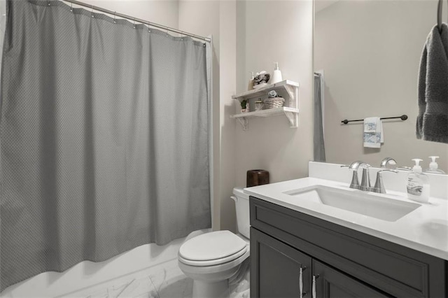 full bathroom with vanity, shower / bath combo with shower curtain, and toilet