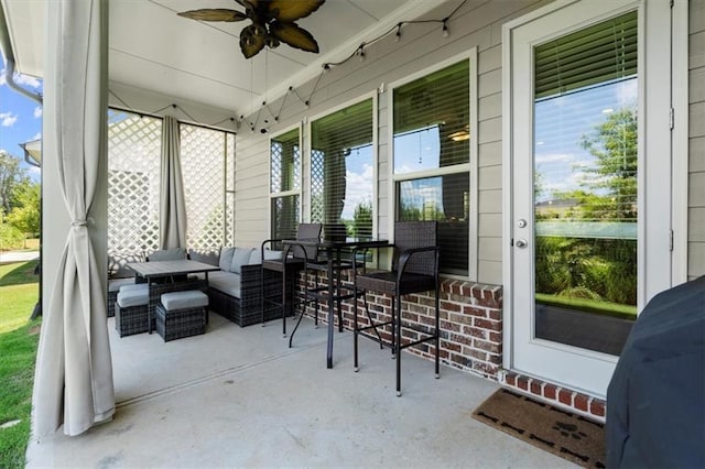 view of patio with covered porch and ceiling fan