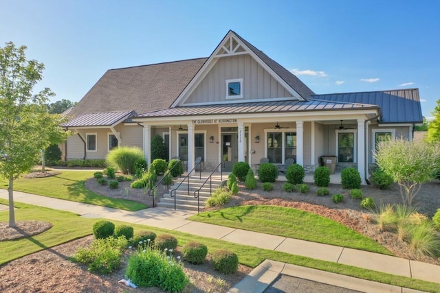 view of front of house with a front lawn and covered porch